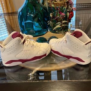 Boys size 1y white and burgundy in color Air Jordan’s